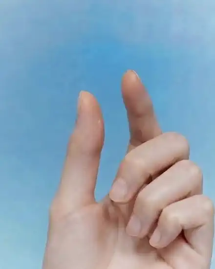 A hand making a small gesture